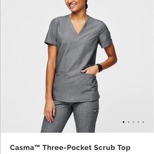 XXS 3 pocket scrub top in graphite.